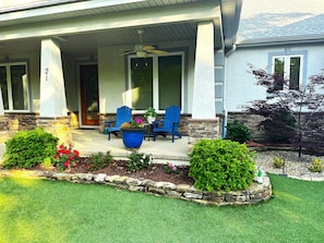 Front porch with adirondack chairs
