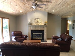 Main room with natural wood shiplap ceilings