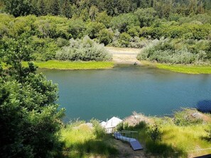 The dock to access the river with the kayaks , floating tubs etc