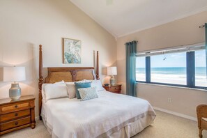 A beautifully appointed Master with King size bed looks out over the ocean.