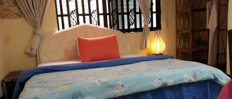 Your private bedroom with attached bathroom , air-conditioned and large window..