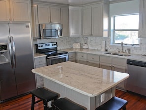 Kitchen with granite and Stainless steel 