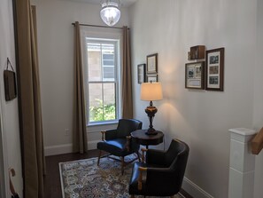 Foyer, with historic information on the home framed on the wall