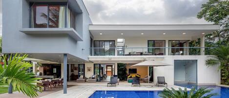 Garden,Patio,Pool view,Property building,Swimming pool