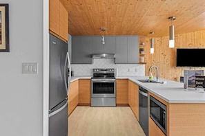 Gorgeous fully equipped kitchen has everything you need for the perfect vacation