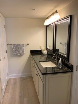 Master vanity area with closets.