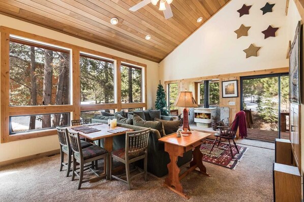 Vaulted ceiling, bright light, cozy atmosphere.