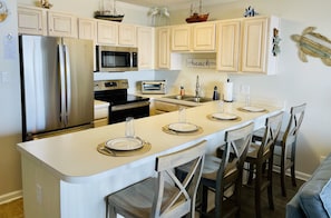 Fully equipped kitchen plus a Keurig and traditional coffee maker.
