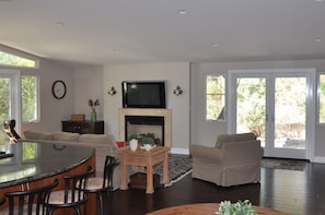 Recently remodeled to take advantage of natural light and wooded setting.