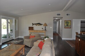 Open plan living room and kitchen; hall to 3 bed / 2 bath; central ac/heat.