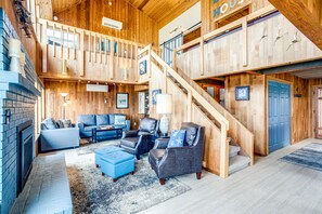 The natural light warms up the wood architecture of the home.