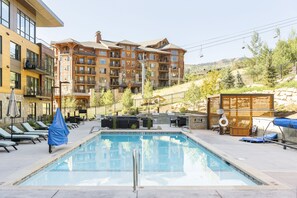 The Lift pool area with Sunrise ski lift in the background on a summer day