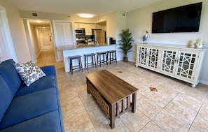 Living Room - Kitchen View. Sofa is a sleeper sofa