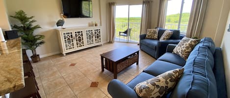 Living Room - 4K TV, Xbox One S with Game Pass, board games and ocean view