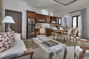 Living area. The modern living room with fitted kitchen