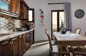 Living area. The modern living room with fitted kitchen