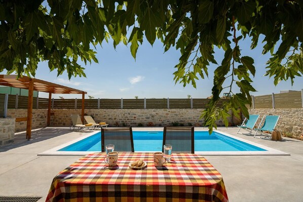 Pool. The private pool 24 sqm with free sunbeds, umbrella and arbour