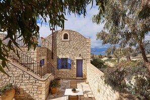 External view of the building. The natural stone villa