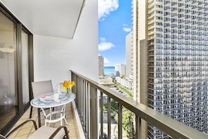 Balcony with beautiful partial ocean view, city, and mountain