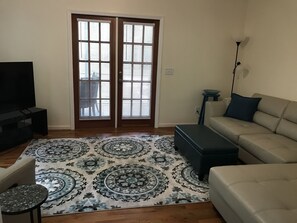 Living room area with 55" smart tv for great streaming