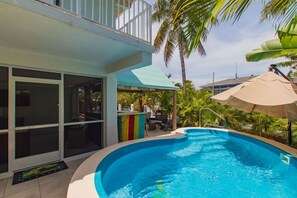 Huge Screened in porch with TV off pool