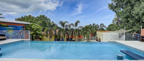 Enjoy our beautiful Garden Of Eden pool. Lounge chairs, Swim up bar, and veranda