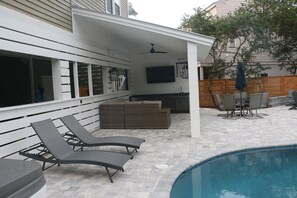 Outdoor TV and covered sitting area