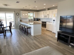 Kitchen and extra large peninsula seating 