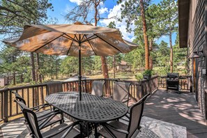 Relax outside on the deck while enjoying the view