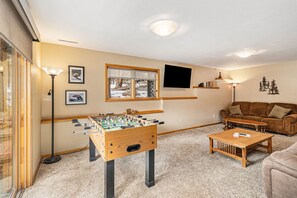 Enjoy a game of foosball or a movie on the big screen