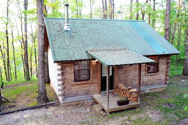 Hidden Ridge Cabin 3, wood stacked for the wood-burning stove or chiminea