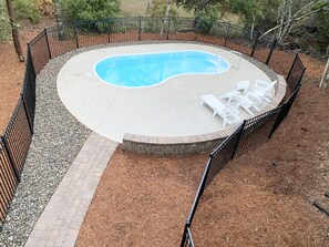 Private pool with fenced in back yard