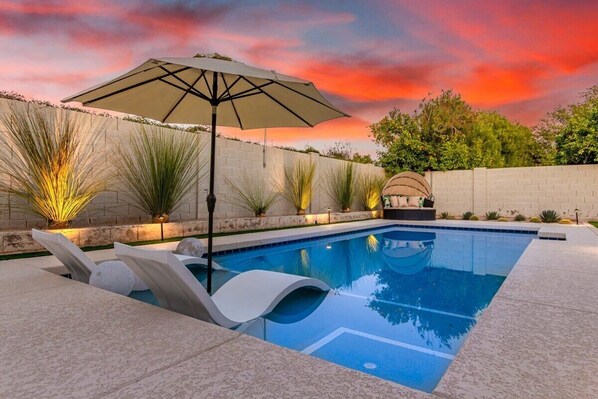 Brand new heated pebble tec pool with baja shelf