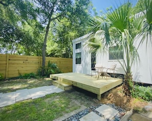Tiny Home features a private yard with deck, patio and tiny pool