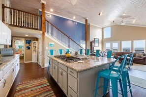 Open floor plan connects kitchen with family area so you never feel secluded.