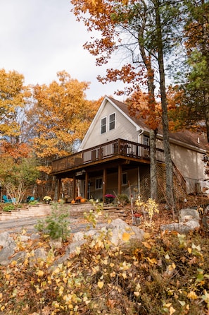 Located up a small mountain; the chalet is tucked on a corner lot.