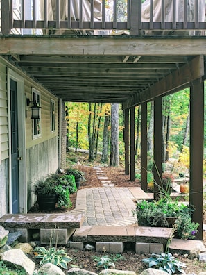 A walkway leads from the driveway up to the main entrance