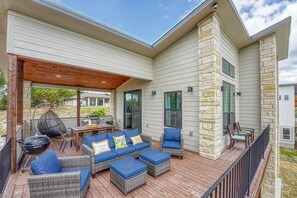 Enjoy the outdoors with comfortable patio seating perfect for entertaining guests.