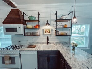 Kitchen, granite counters, walnut accents