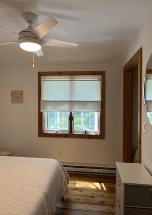 Second bedroom, with beautiful afternoon sunlight, a ceiling fan and airy feel