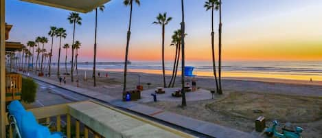 Beautiful sunset over the ocean from the balcony of A22 - Oceanfront Dream