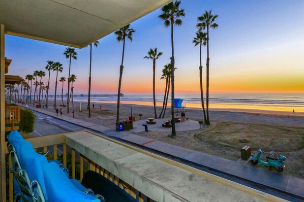 Beautiful sunset over the ocean from the balcony of A22 - Oceanfront Dream