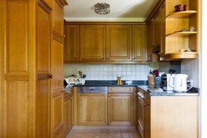 the wooden and charming kitchen 