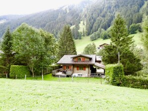 the sweet chalet in the green field 