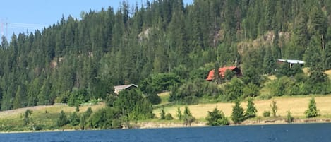 From the lake. The studio is under the red roof