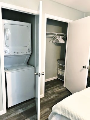 Closets in master bedroom; stack-able washer dryer.