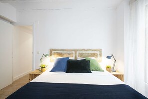 Bedroom with Queen-sized bed and two balconies