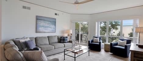 Updated Living area with ample seating. Ocean & Courtyard views.