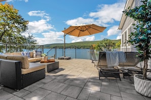 Side patio with 180 degree view of the lake.  