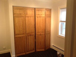 M bedroom closet with shelving